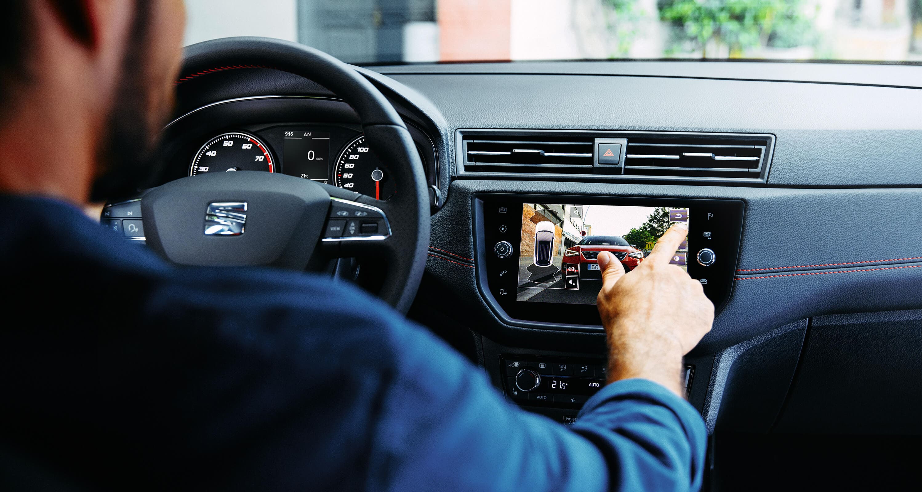 SEAT Arona interior console technology. Showing the SEAT Arona interior steering wheel driving and console technology 