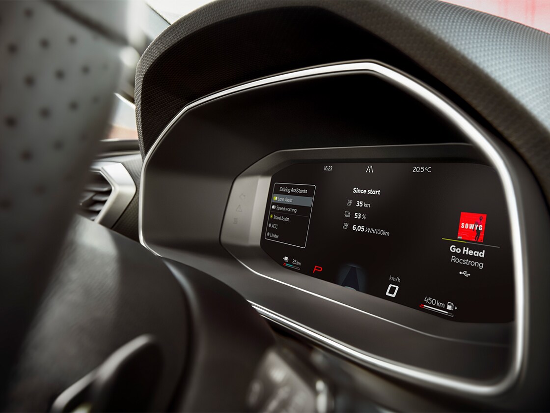 Interior view of the seat leon 2025's digital dashboard, compatible with wireless apple carplay and carplay android auto, allong with lane assist and advanced driving aids.