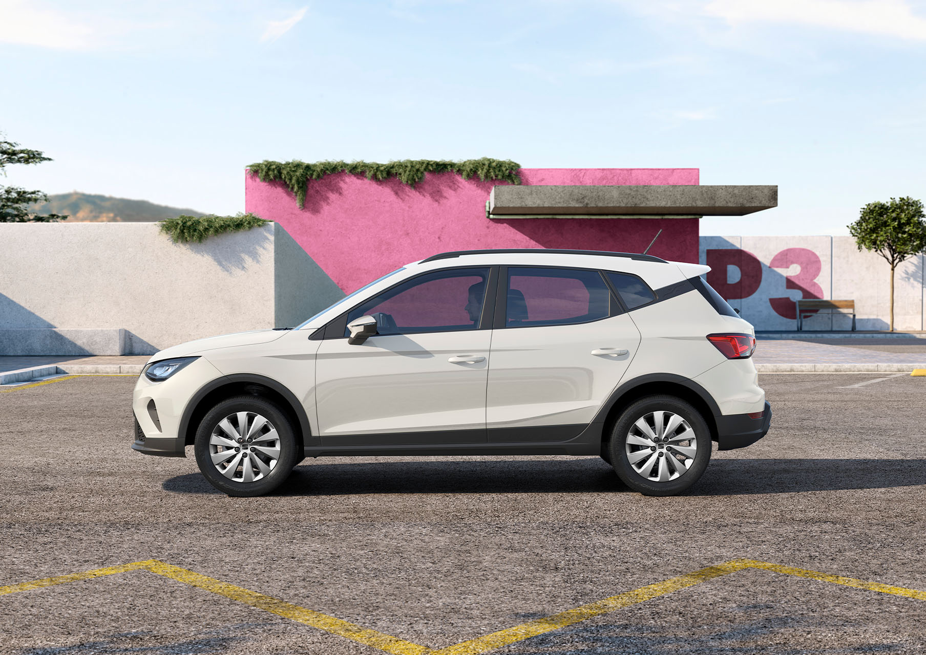 lateral view of a seat arona reference in white color parked