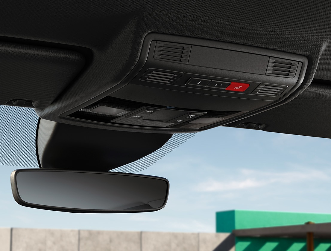 close-up of the front interior car design to showcase the services that you can access through the integrated buttons, such as the breakdown call.