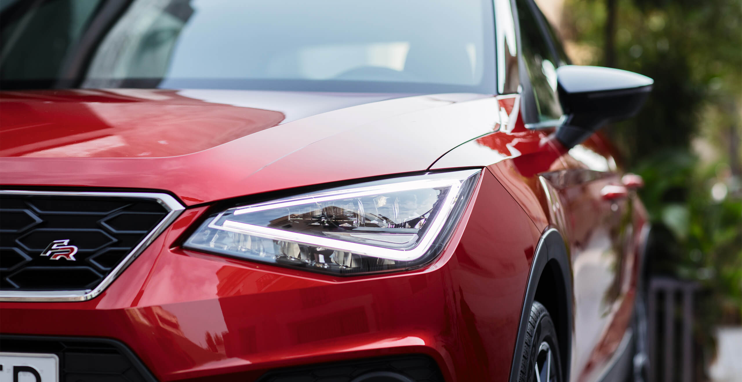 SEAT service and maintenance – Front view of the headlamp of a new SEAT car